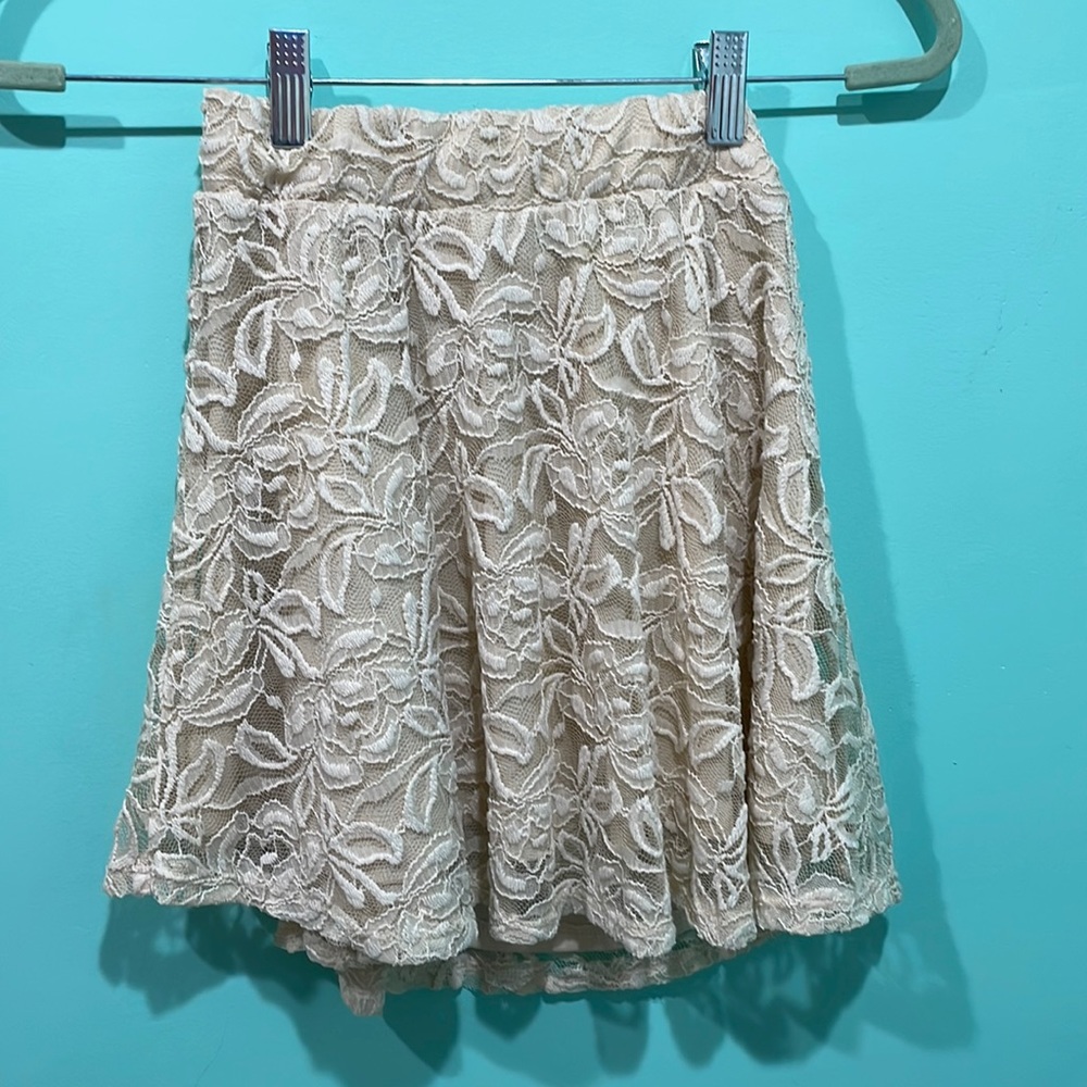 we’re in the process of a closest clean out sry.. lace skirt, mid thigh length